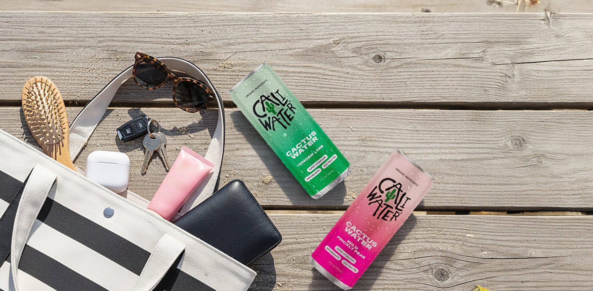 Caliwater Cactus Water and essential items spilling out of a purse